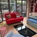 Hinged Glass Cellar Door Over a Spiral Staircase, London Living Room